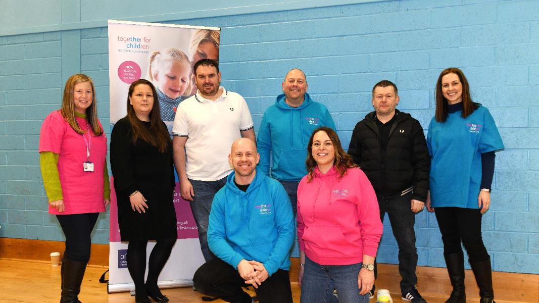 Members of our Fostering Team with three of our Foster Carers