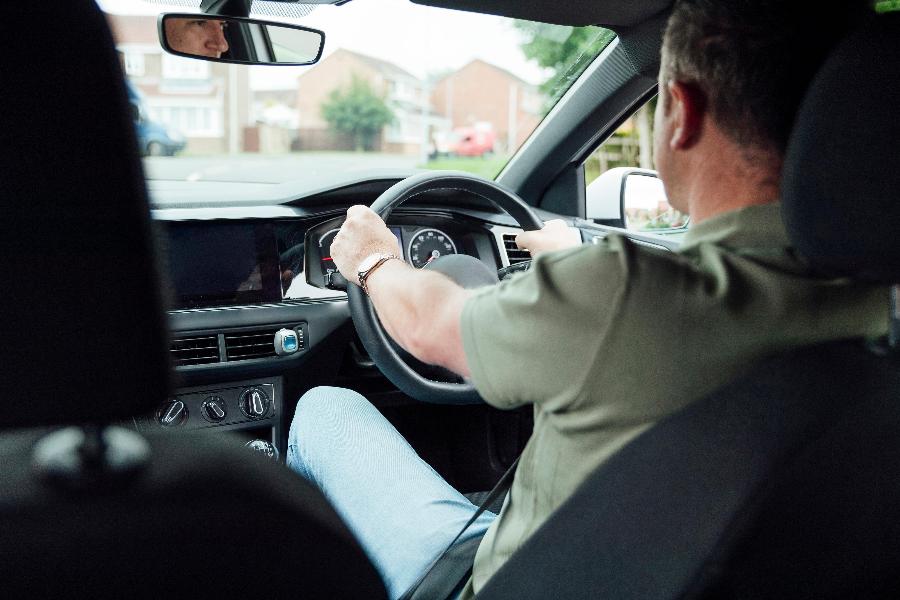 Man driving a car