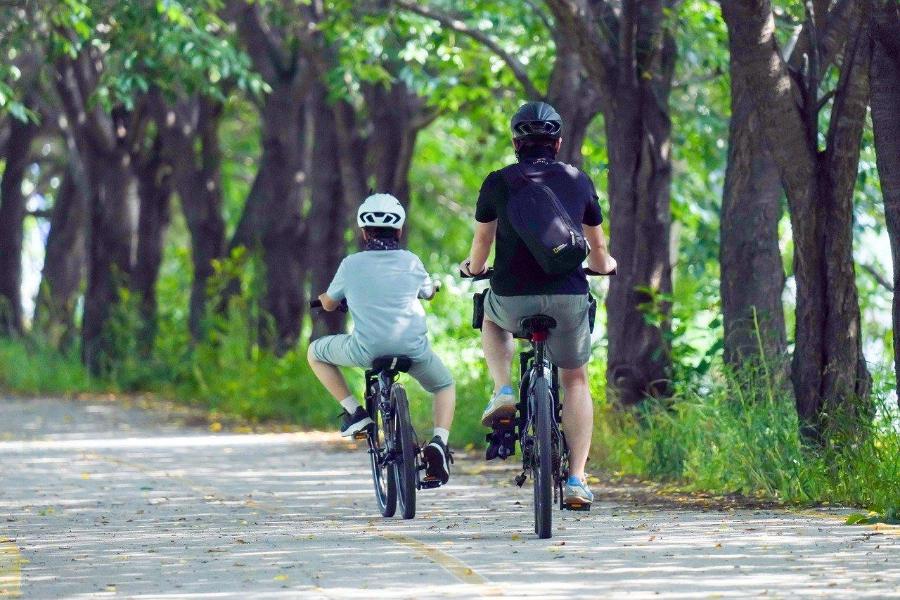 Child and woman on a bike