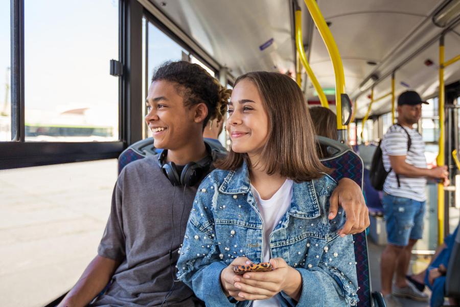 Young couple on bus