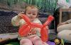 Little girl with balloon animal dog