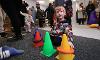 boy playing with cones and rings