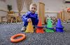 Little boy with cones and rings