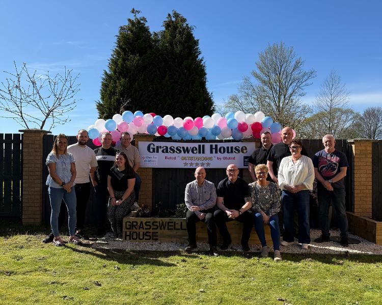 The team at Grasswell House children's home which has just been rated outstanding by Ofsted