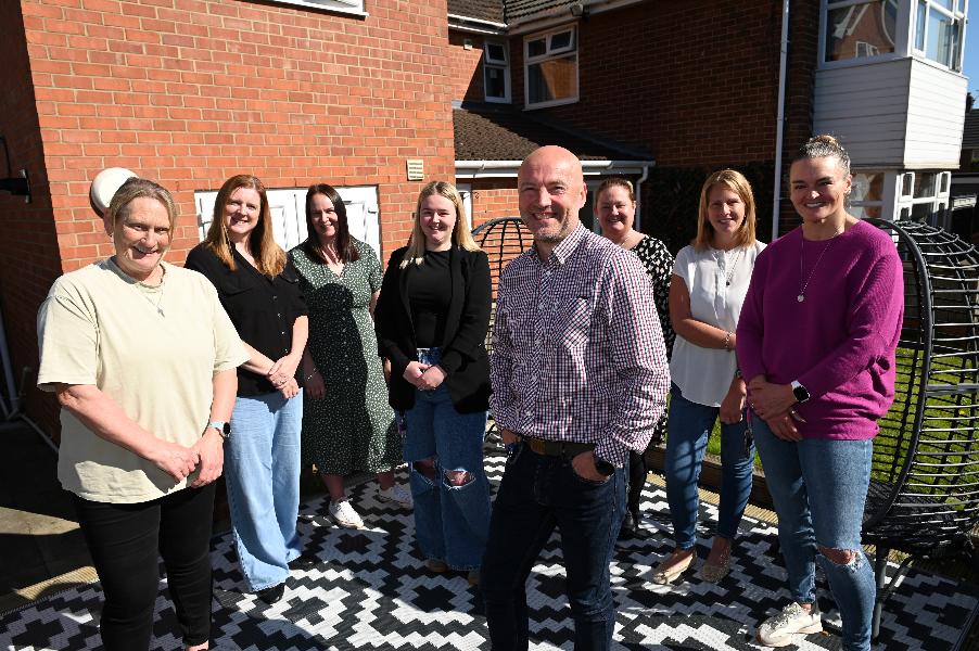 Revelstoke Road home manager Mark Christie (front) with staff from Revelstoke Road Children's Home.
