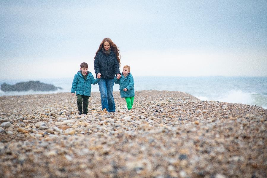 Fostering family on the beach 